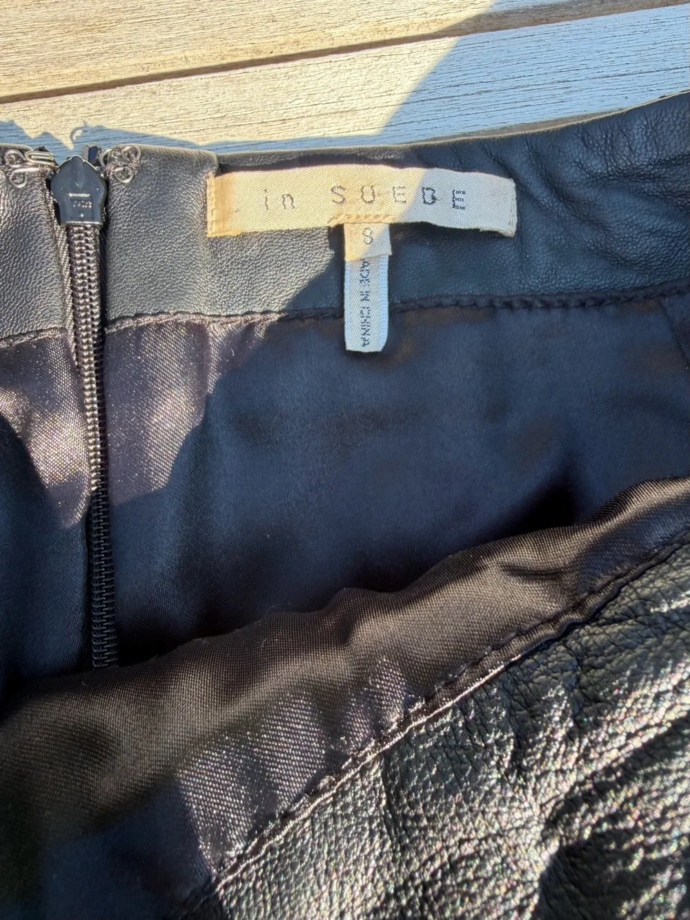 Black Quilted Mini Skirt with Decorative Button Pockets